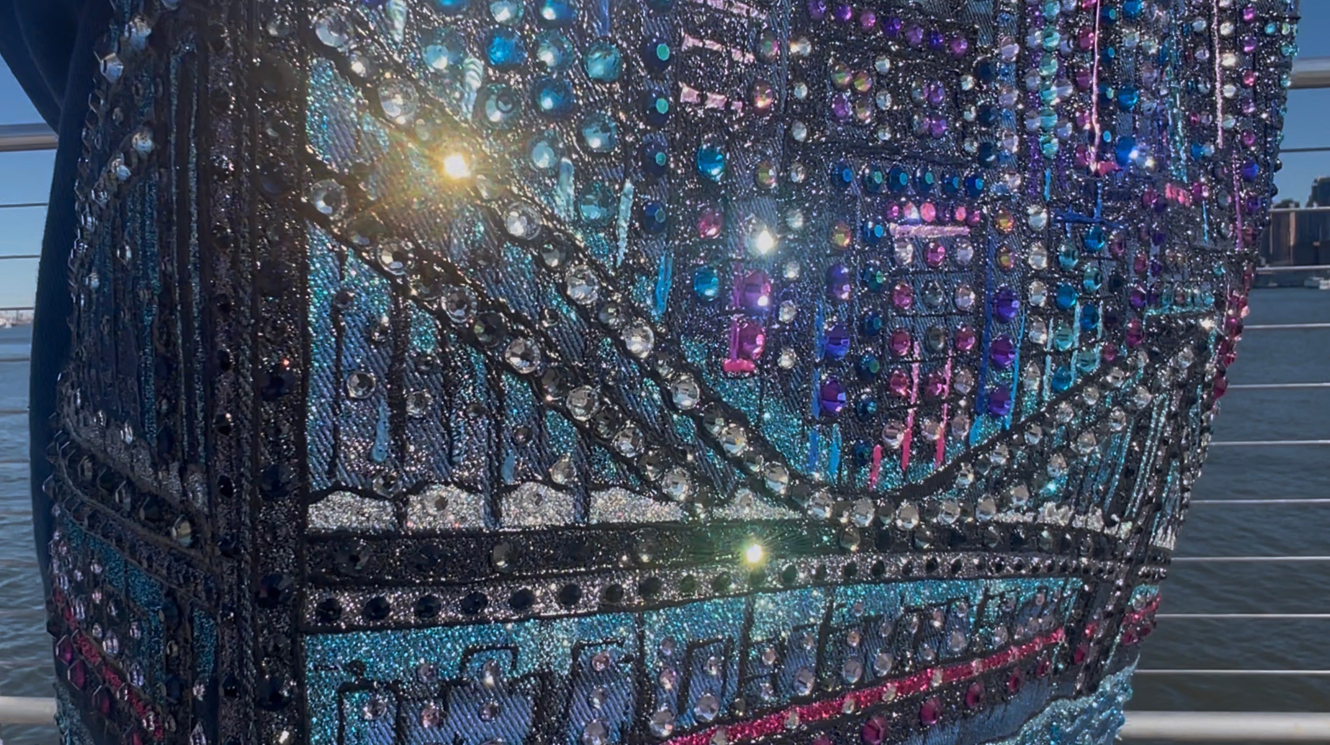 Decorative object with Loria NYC Art multicolored gemstones on a blurred background