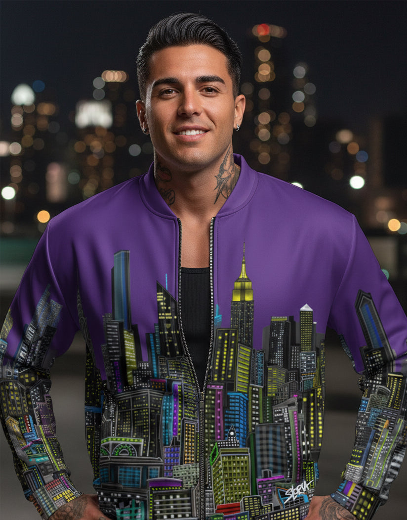 Man wearing a purple Loria. NYC Art jacket with cityscape design against a blurred city night background