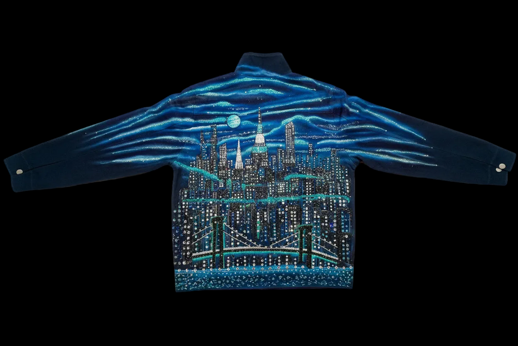 Elevated view of a jacket with a cityscape Loria NYC Art design on a black background