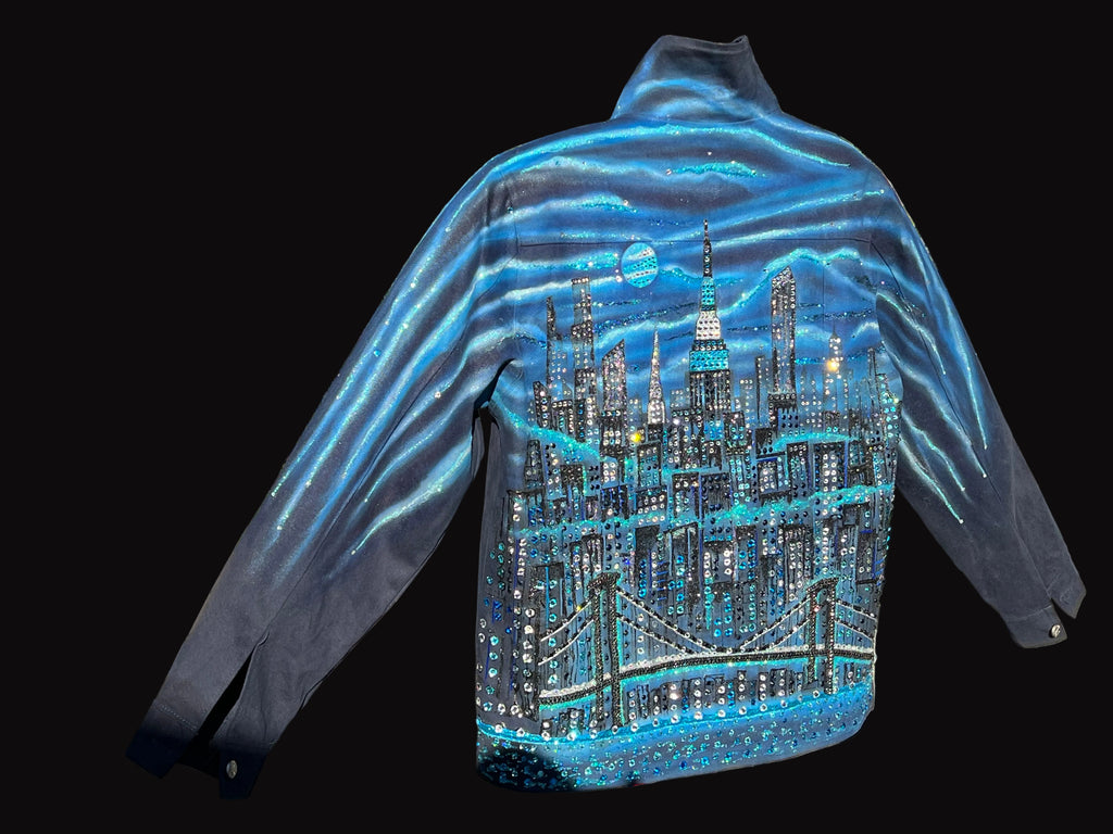 Blue jacket with a cityscape Loria NYC Art design on the back.