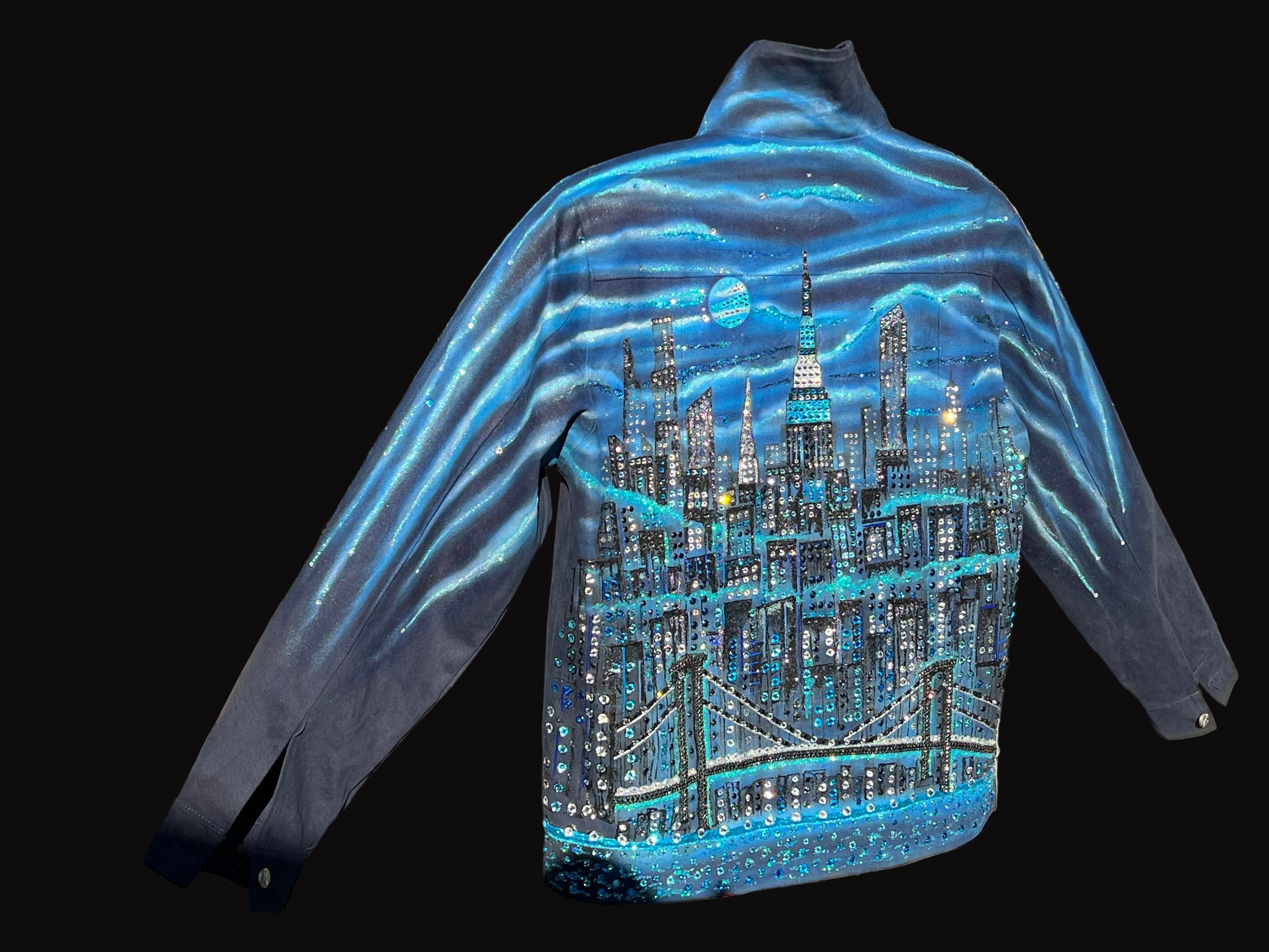 Blue jacket with a cityscape Loria NYC Art design on the back.