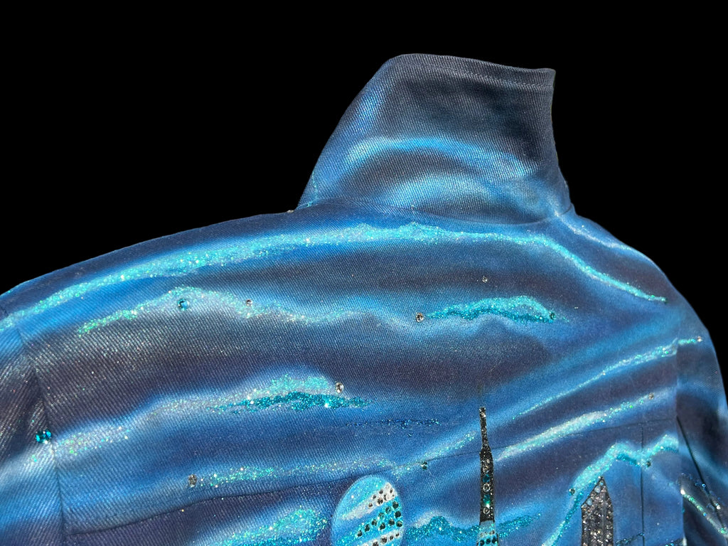 Blue fabric jacket Loria NYC Art against a black background