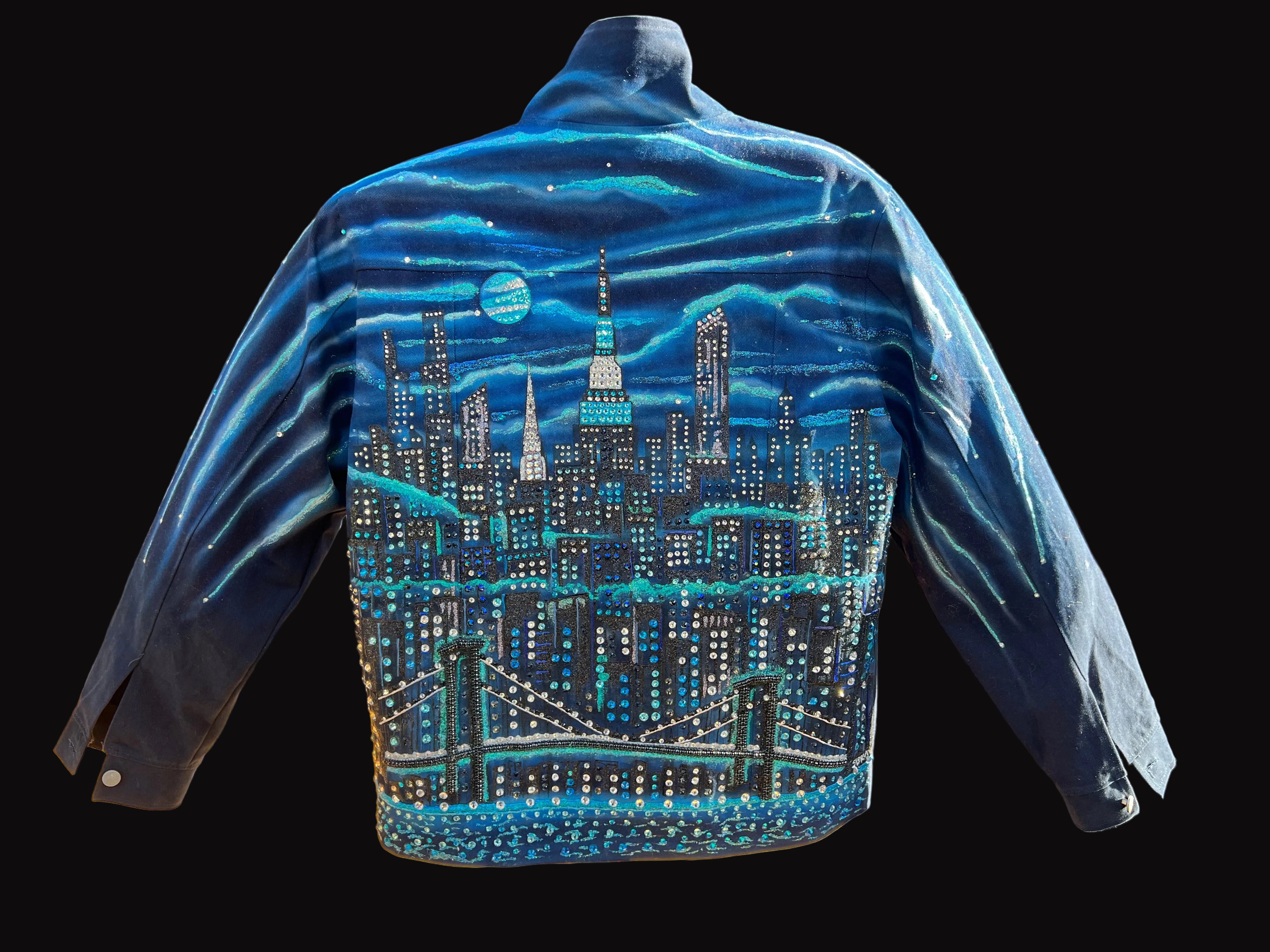 Blue denim jacket with a cityscape LorIa NYC Art design on a black background 
