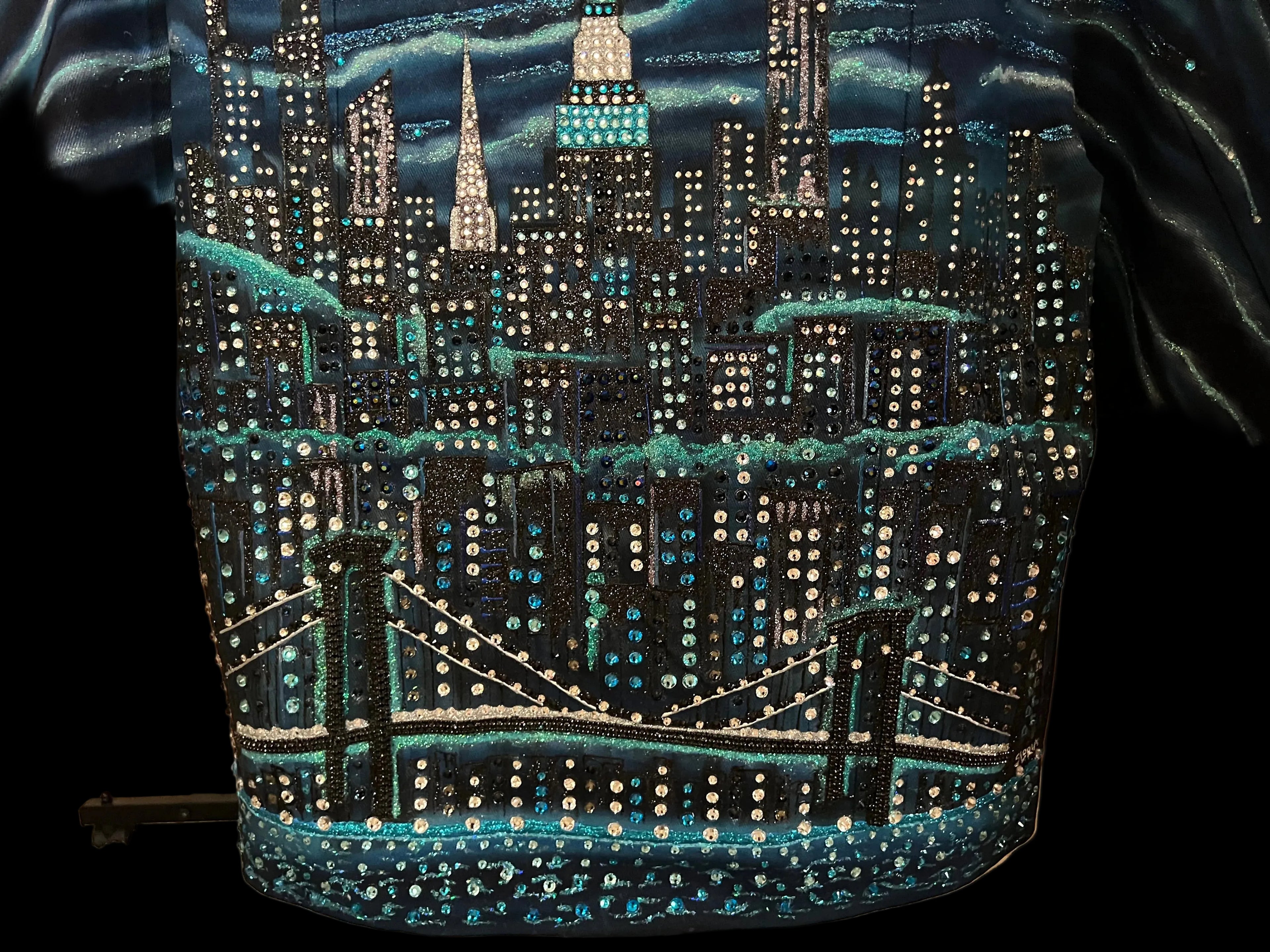 Blue Loria NYC Art with cityscape design on a jacket
