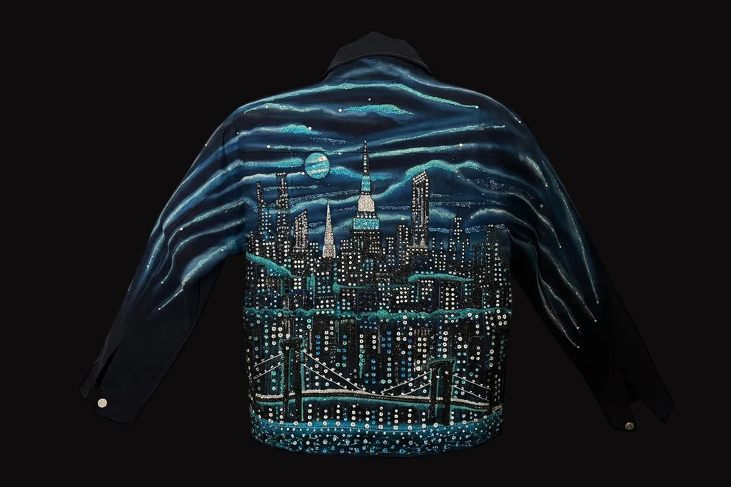 Jacket with a cityscape Loria NYC Art design on a mannequin in a black setting
