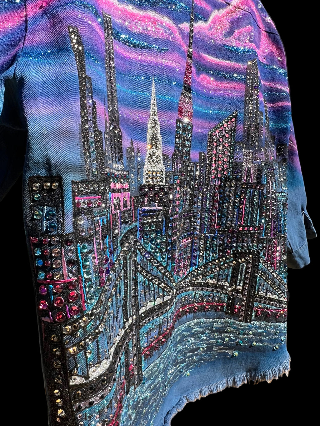 Close-up of a colorful, Loria NYC Art embellished fabric with intricate patterns.