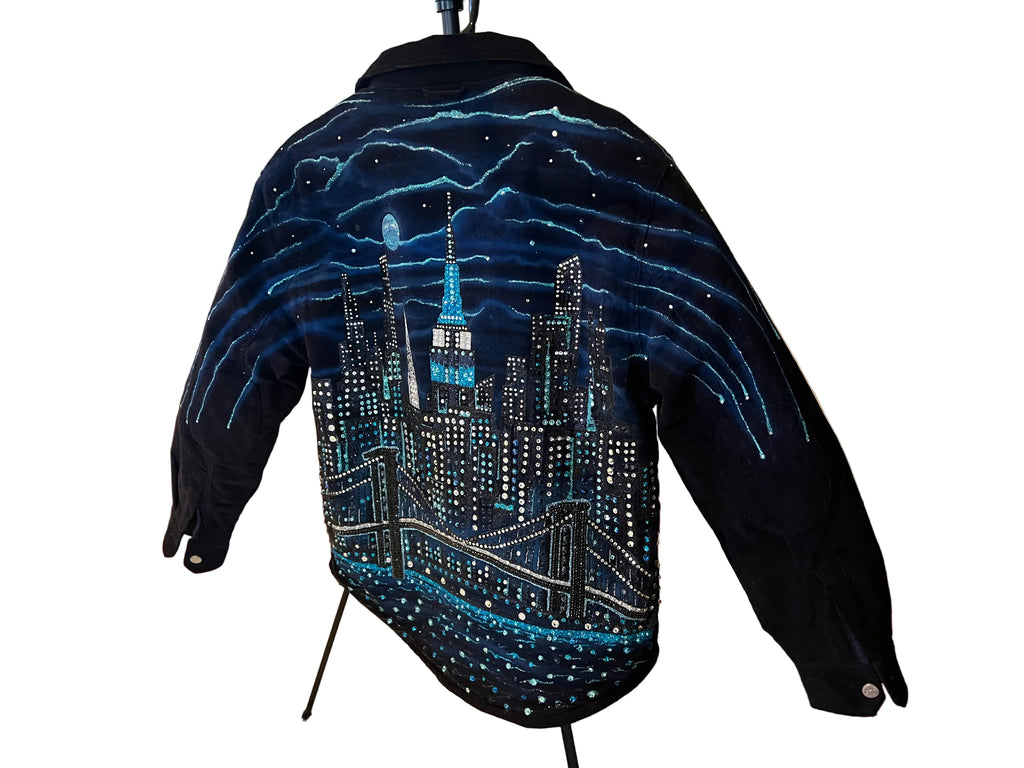 Black jacket with a cityscape Loria NYC Art design on a mannequin in a room