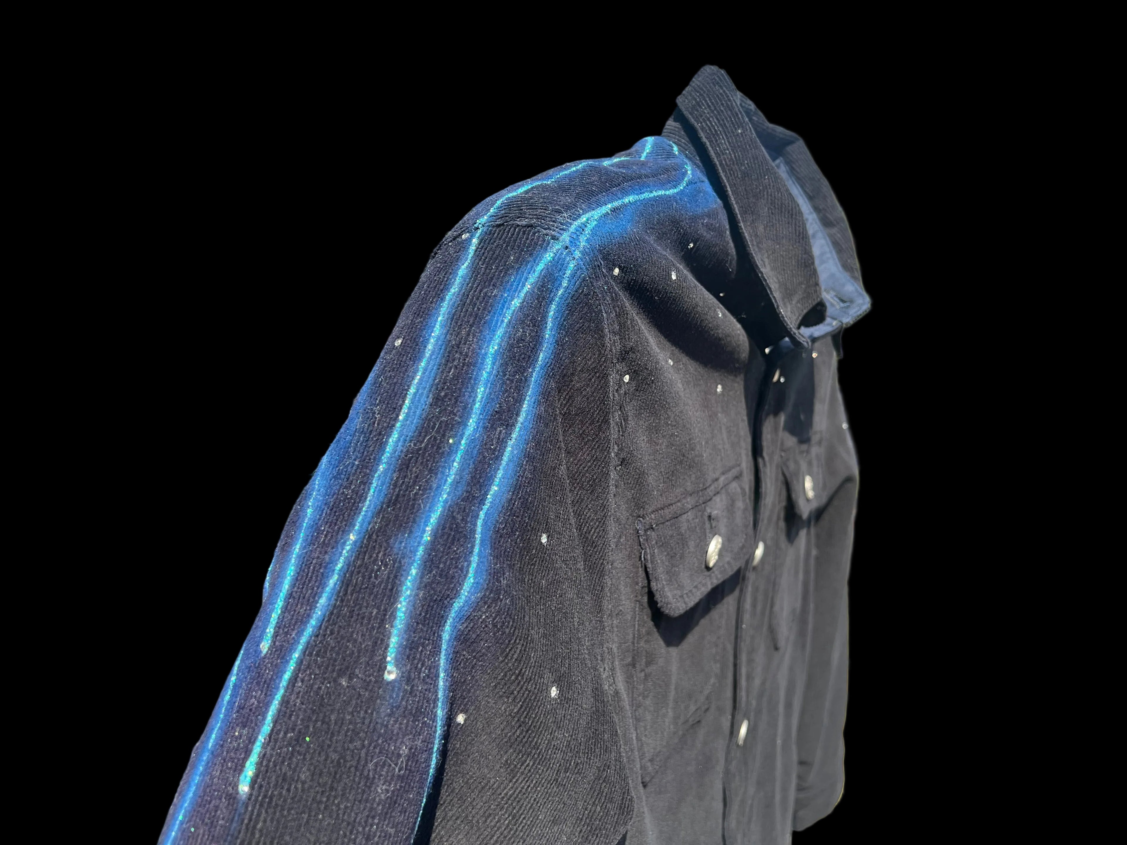 Blue  jacket with blue Loria NYC Art accents on a black background 