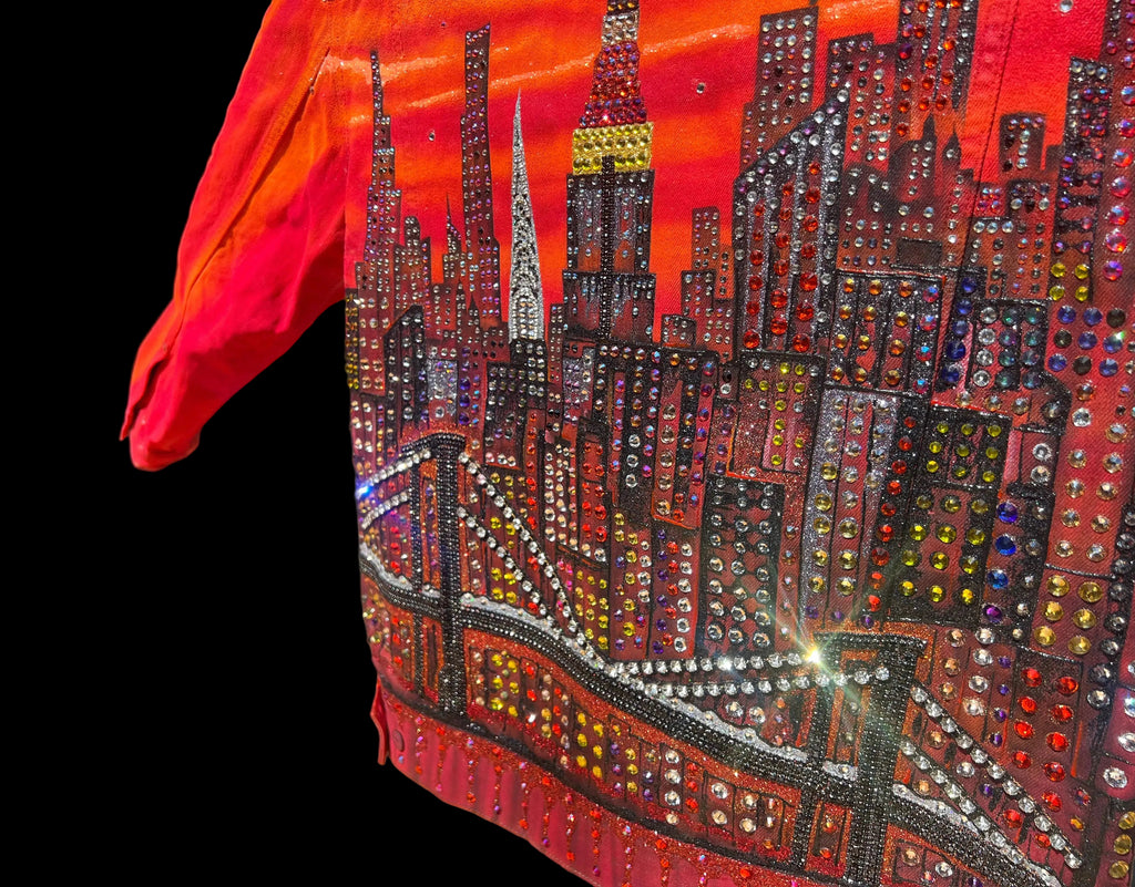Decorative fabric with a cityscape Loria NYC Art design on a black background.