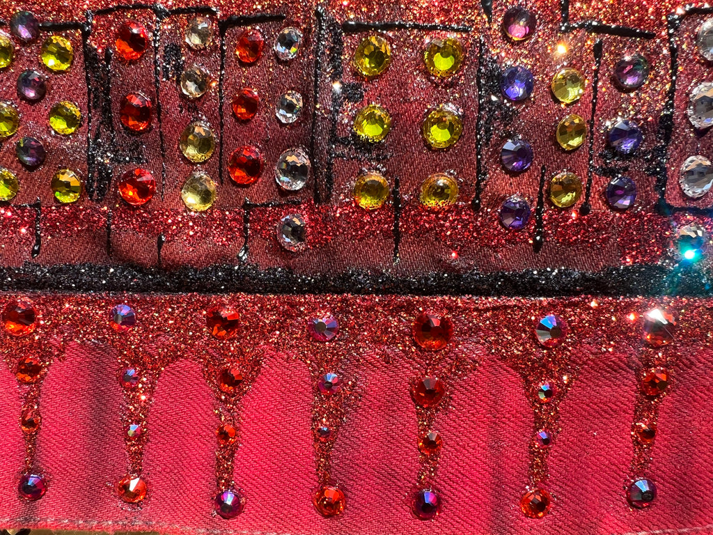 Decorative clutch with Loria NYC Art colorful gemstones and glittery texture