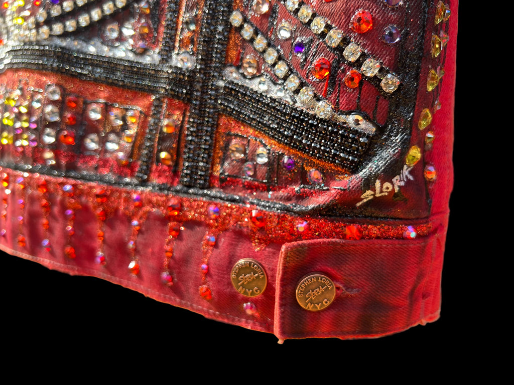 Close-up of a red jacket with  Loria NYC Art intricate beadwork and embroidery.