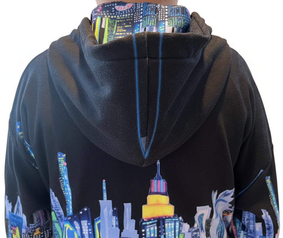 Black hoodie with colorful Loria NYC Art cityscape design on a white background