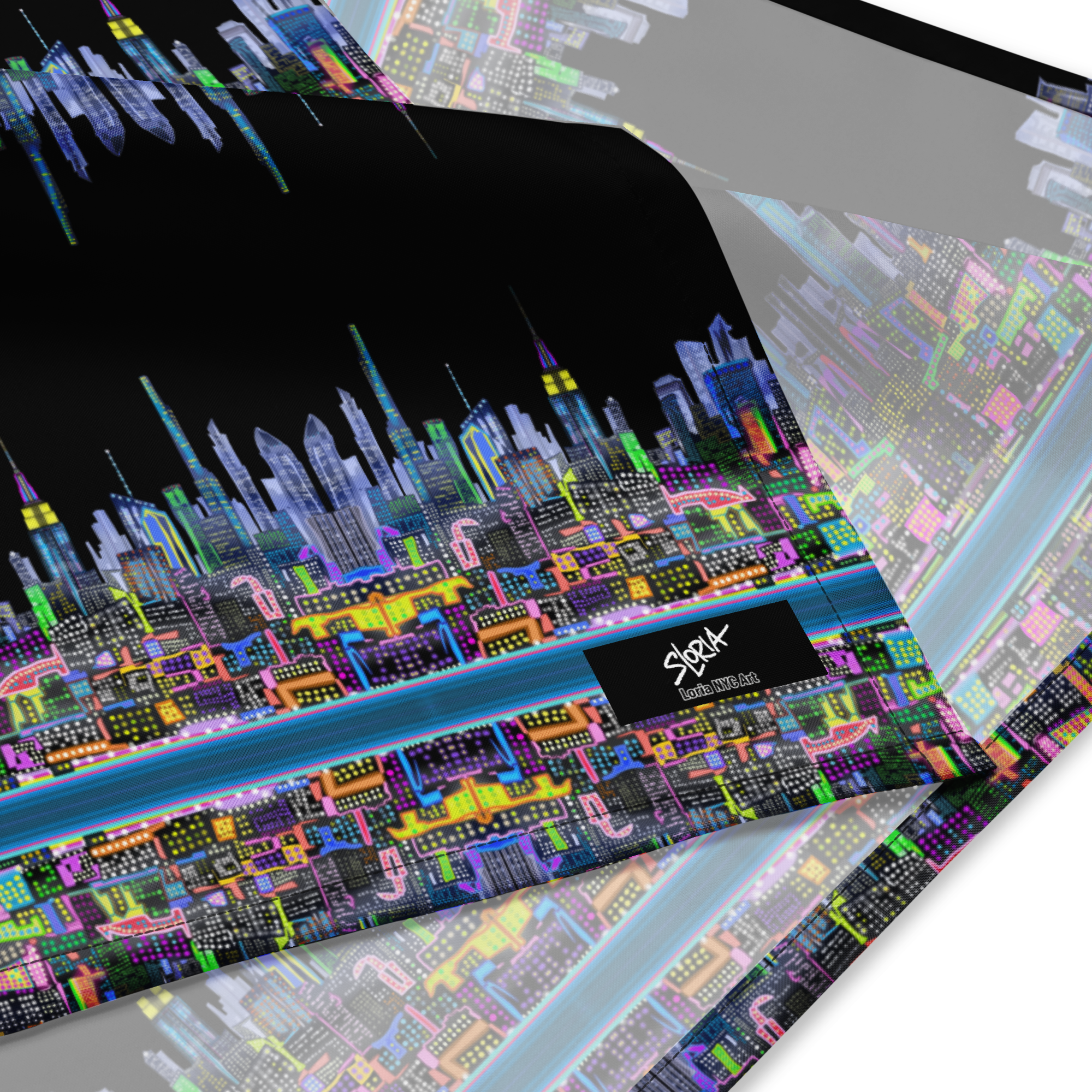 Loria NYC Art with cityscape design and brand logo on a reflective surface