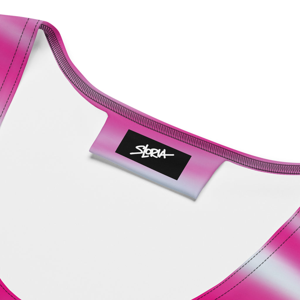 Close-up of a pink and white dress with a brand label S.Loria on a white background