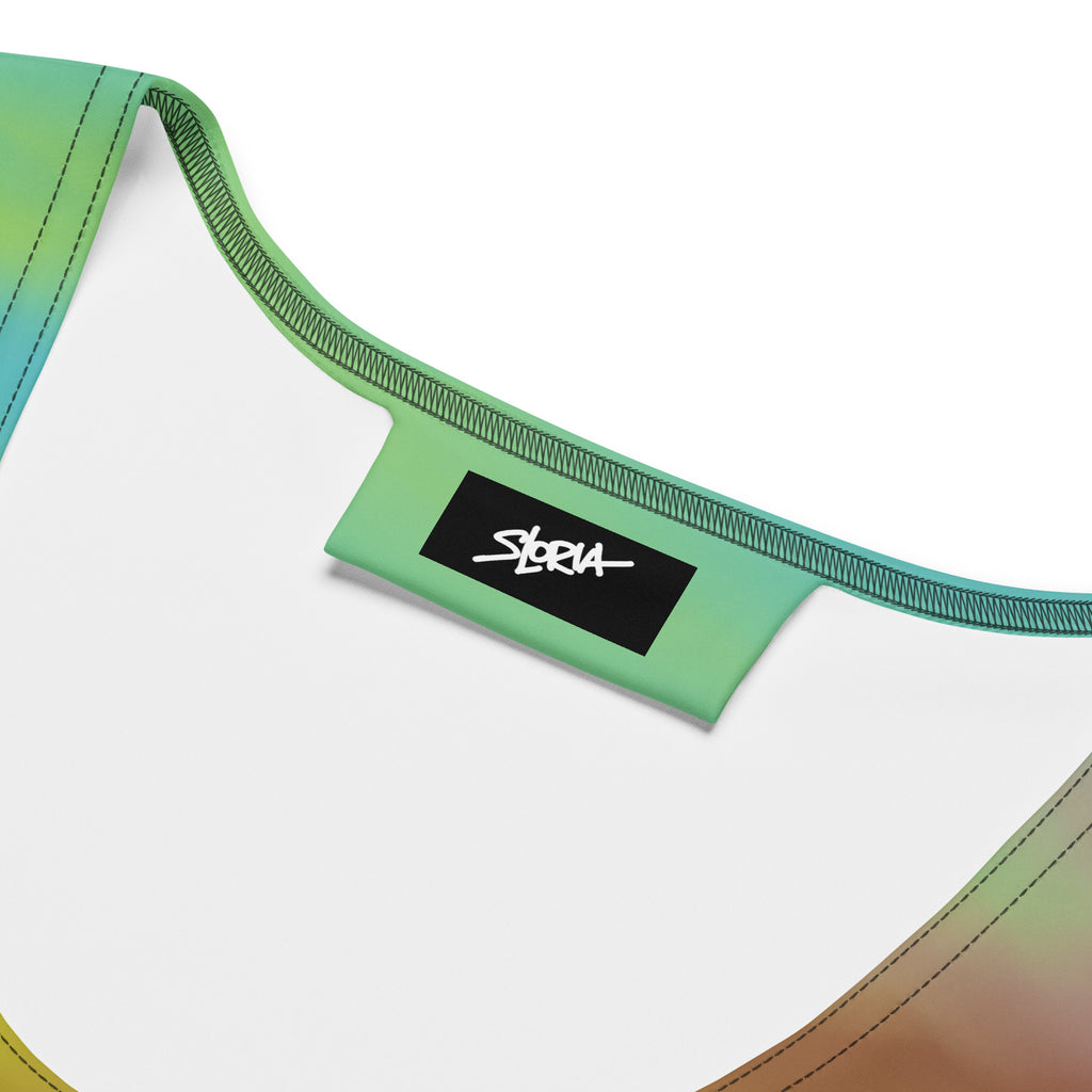 Close-up of a dress top with a designer brand label S.Loria on a white background