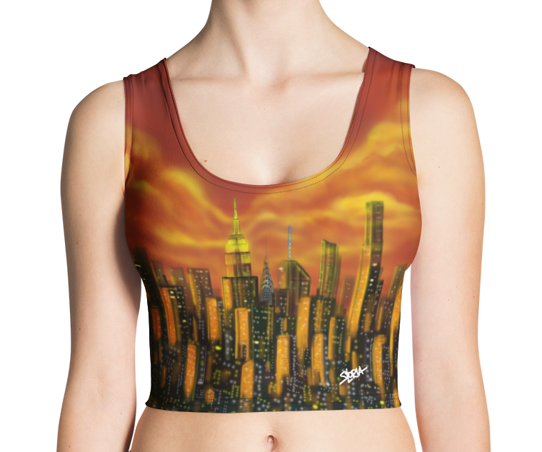 Person wearing a crop top with a Loria NYC Art cityscape design on a white background