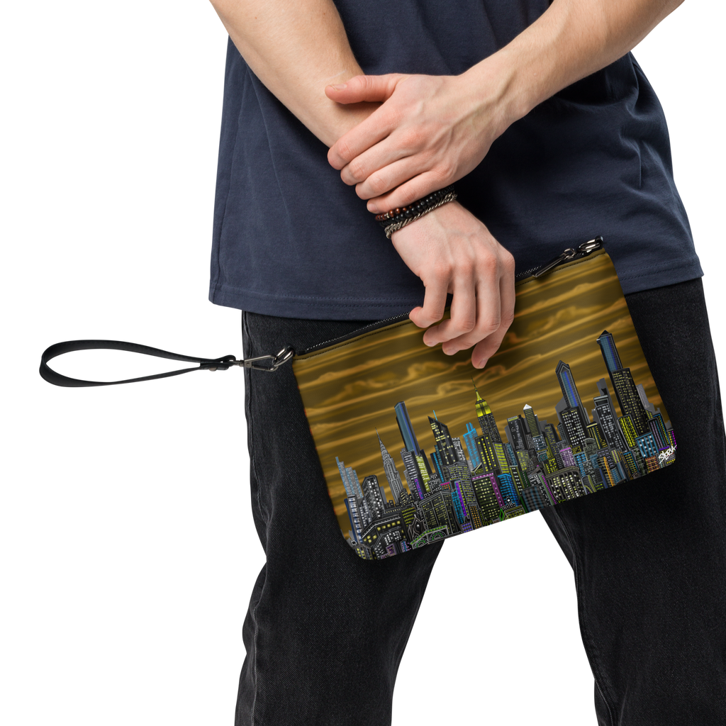 Person holding a clutch with Loria NYC Art cityscape design