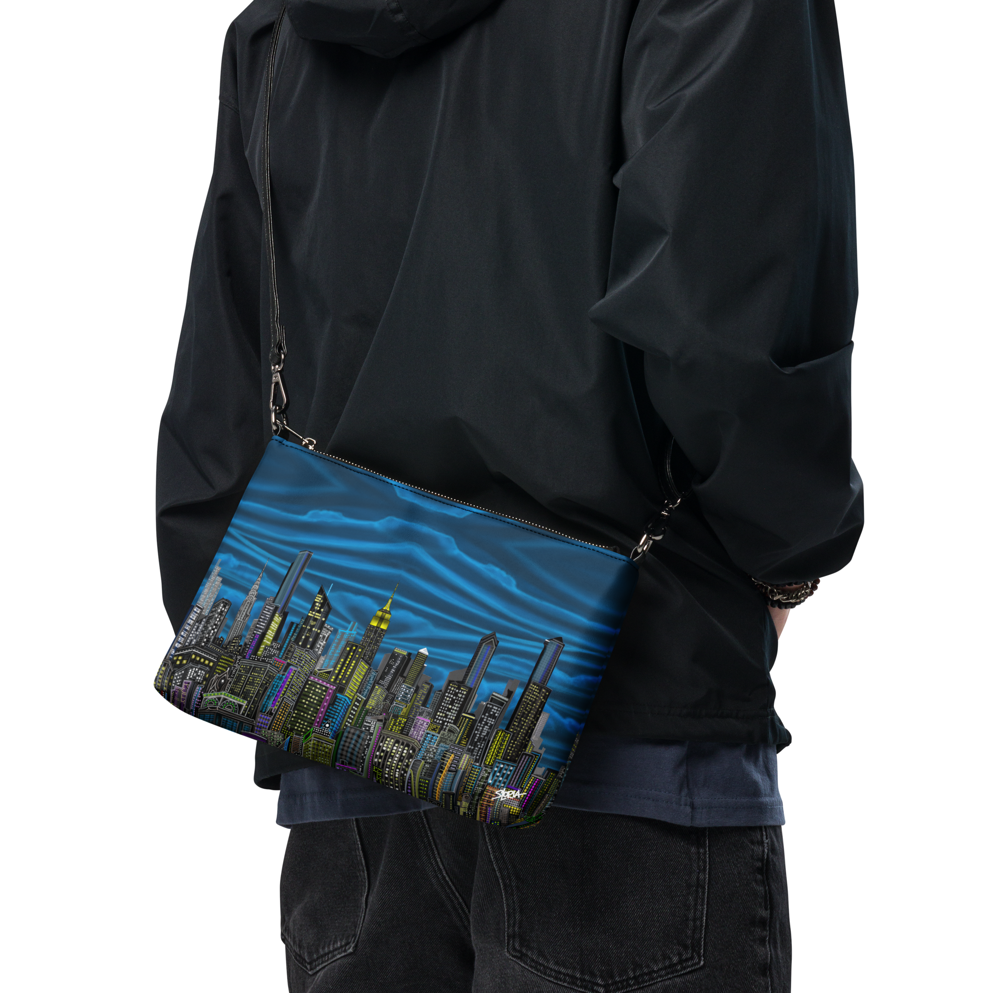 Person wearing a black jacket holding a blue clutch with Loria NYC Art cityscape design