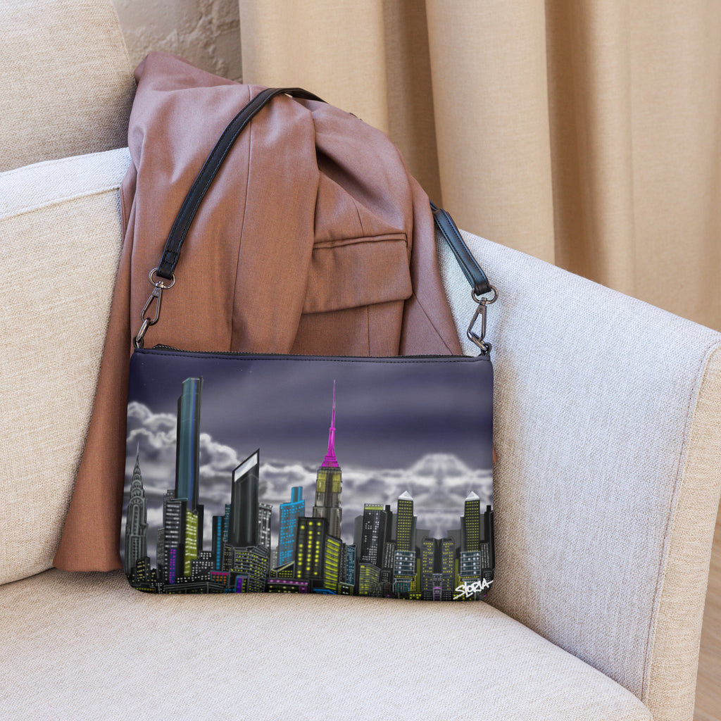 Cityscape bag with a leather jacket on a beige couch