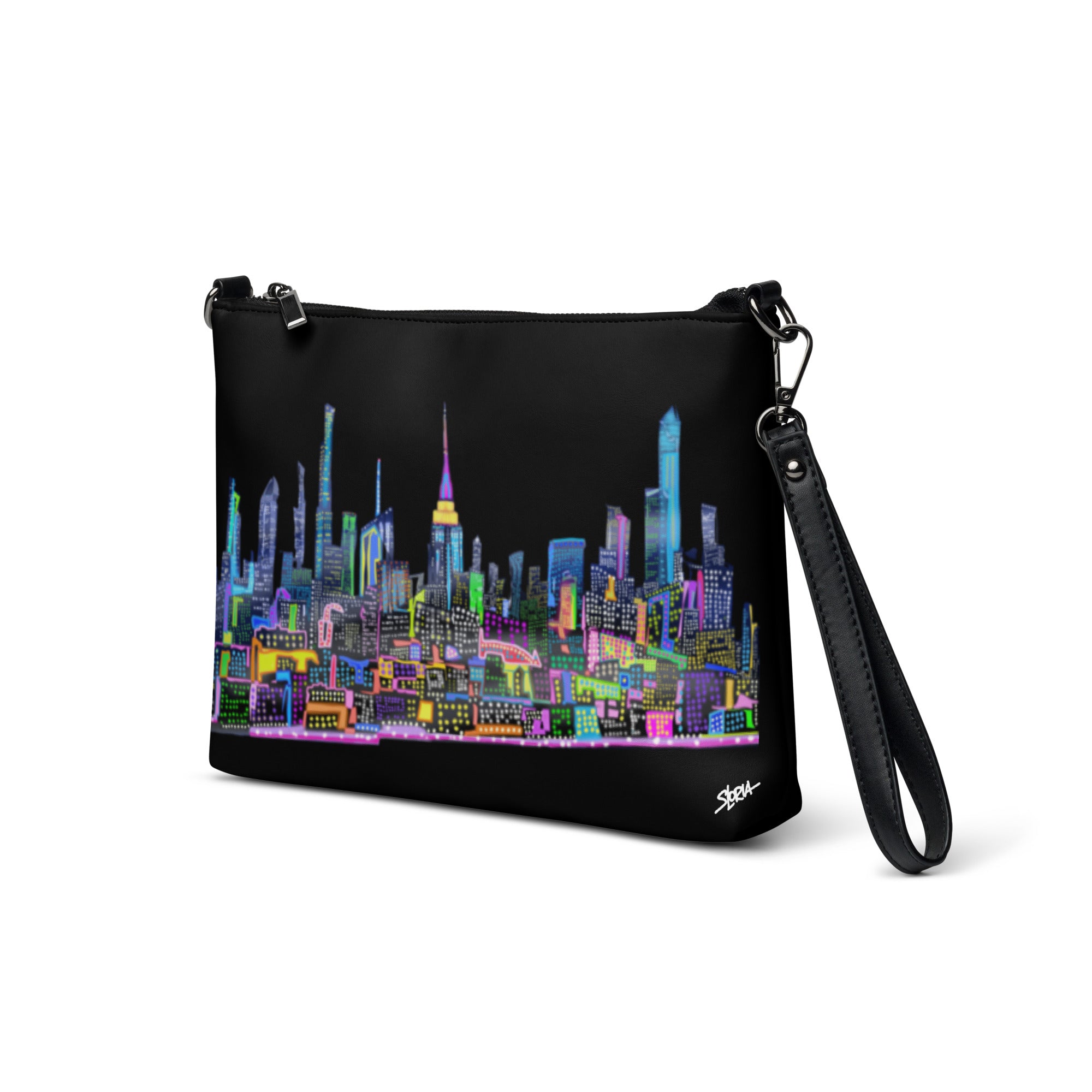 Black crossbody bag with colorful Loria NYC Art cityscape design on a white background