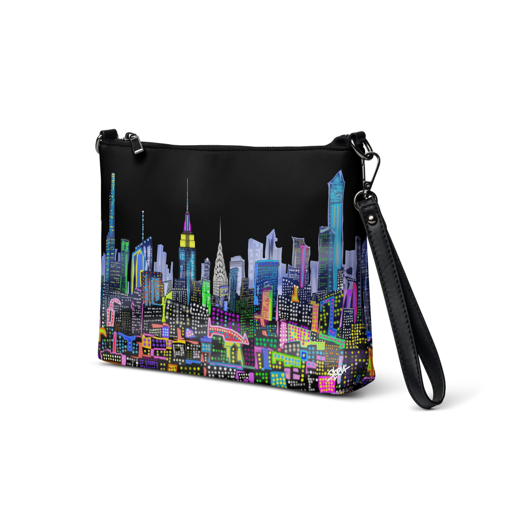 Side angle view of Black crossbody bag with Loria NYC Art colorful cityscape design on a transparent background