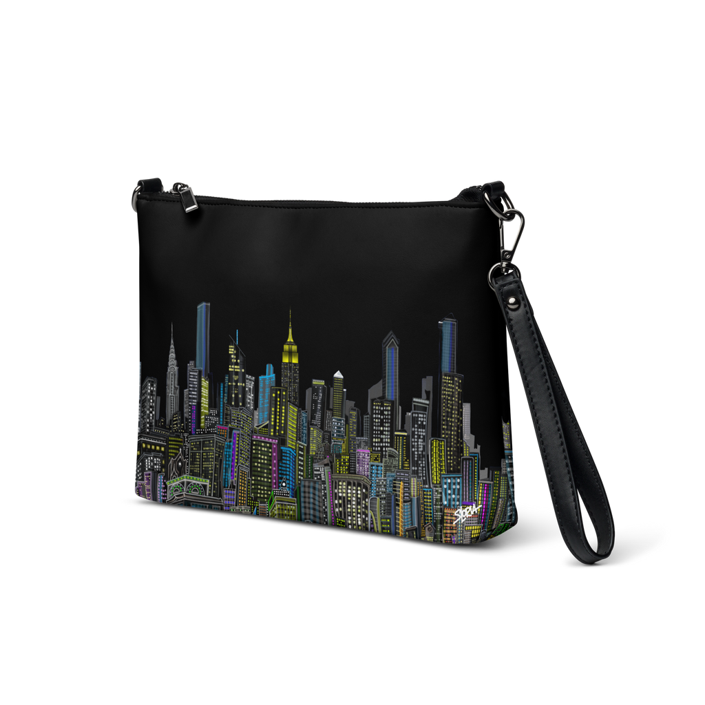 Black crossbody bag with Loria NYC Art cityscape design on a white background