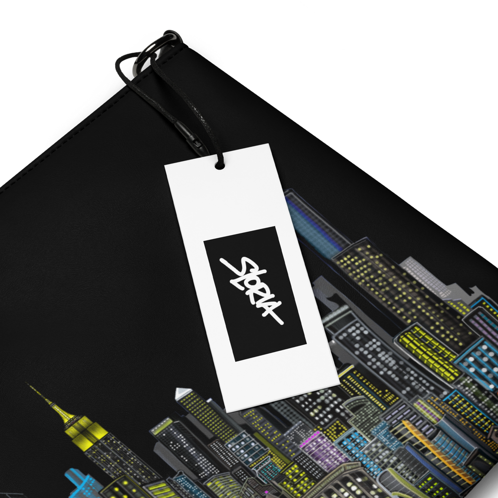 Black drawstring bag with a Loria NYC Art cityscape design and a white tag featuring a logo.