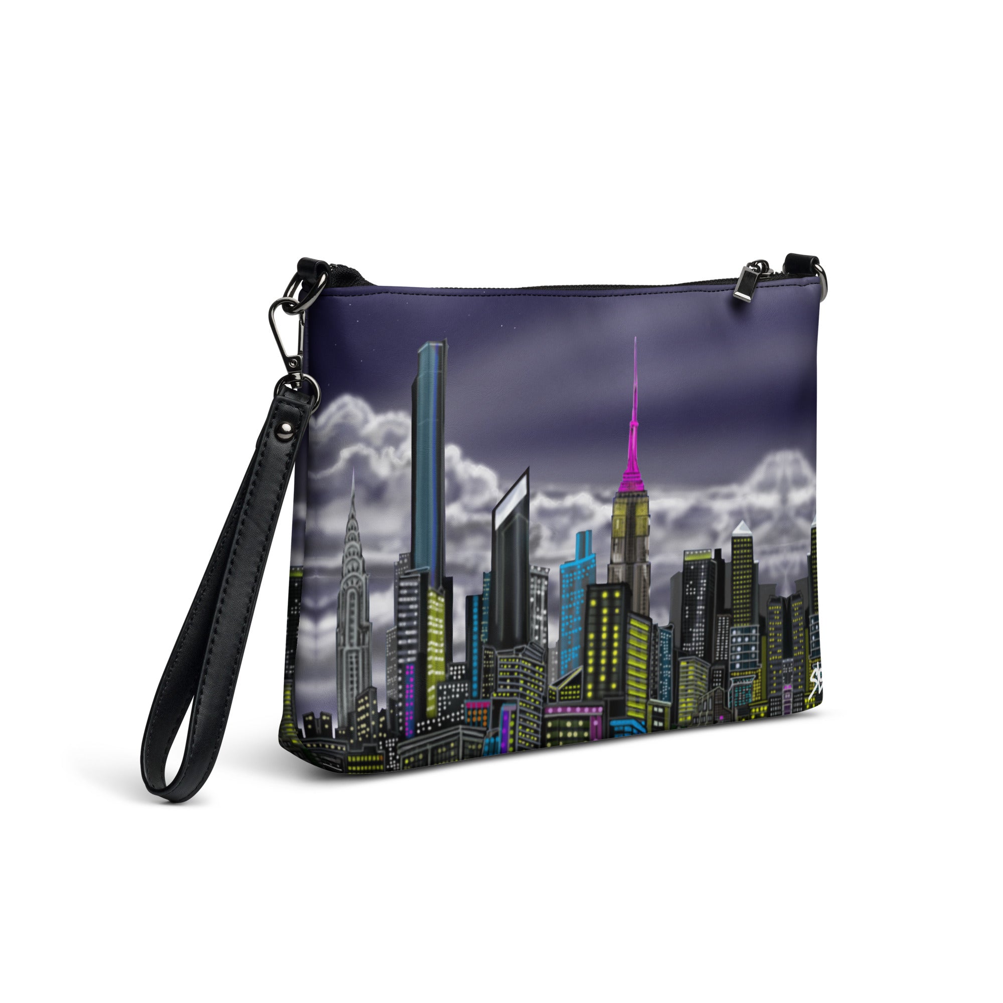Crossbody bag with Loria NYC Art cityscape design on a white background