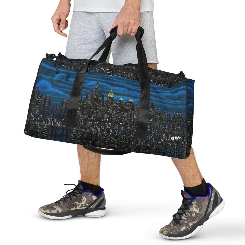Man carrying a Loria NYC Art designed duffle bag on  white background 