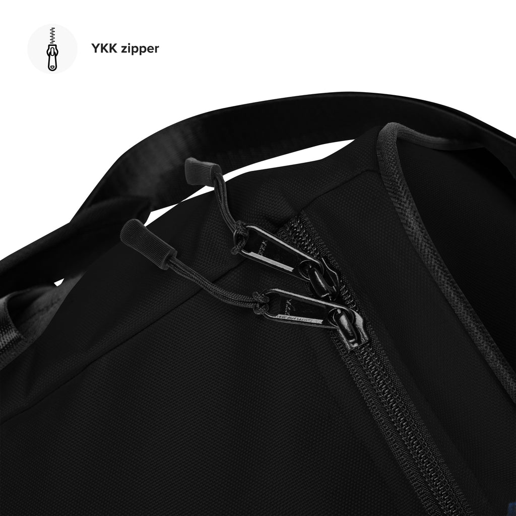Close-up of a black Loria NYC Art bag with YKK zipper on a white background