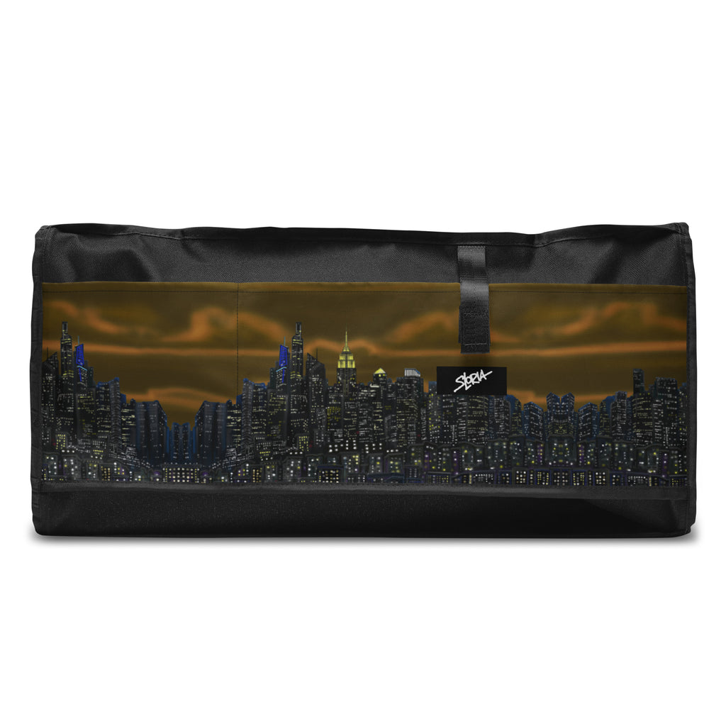 Brown Duffle bag with NY cityscape design by Loria NYC Art  on a white background