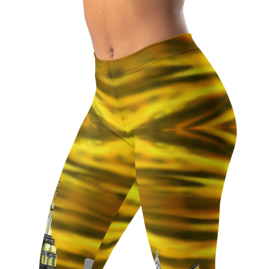 Yellow and black Loria NYC Art leggings on a white background