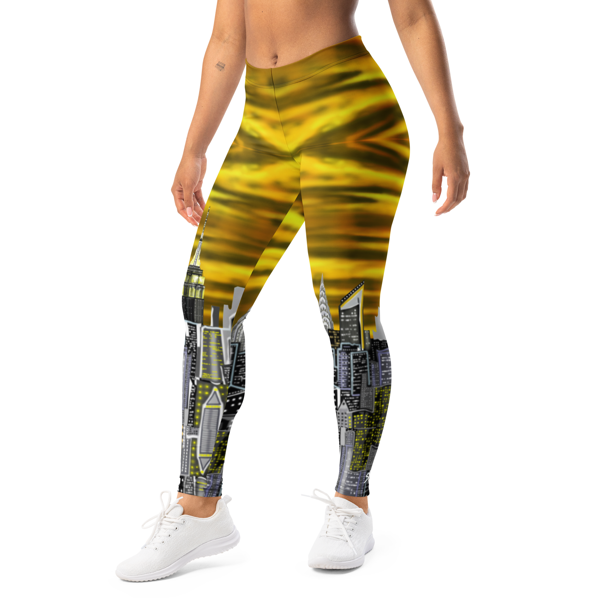 Leggings with a yellow and black abstract Loria NYC Art worn by a person on a white background