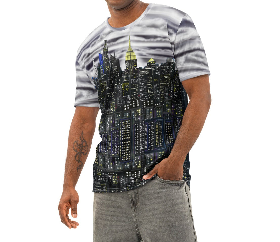 Man wearing a Loria NYC Art shirt and gray pants on a white background