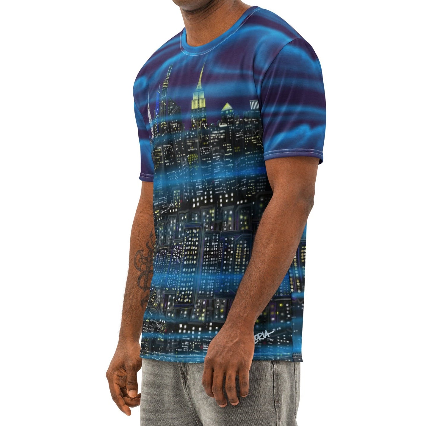Man wearing a blue and purple Loria NYC Art cityscape t-shirt on a white background