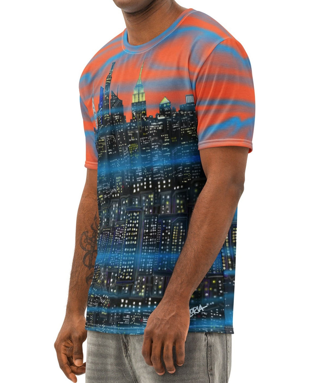 Man wearing a Loria NYC Art colorful striped t-shirt with a cityscape design on a white background