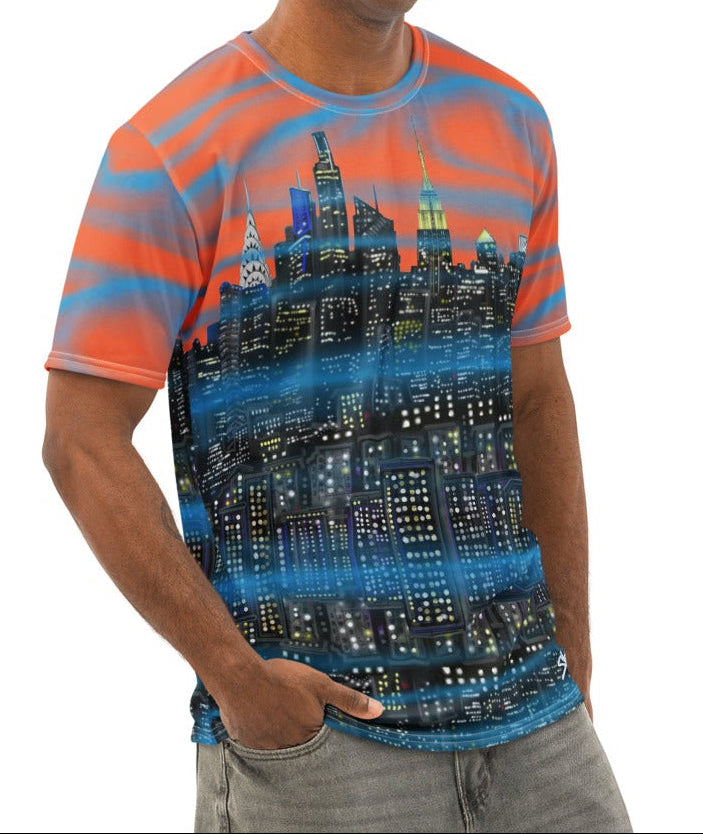 Man wearing a colorful Loria NYC Art  t-shirt with a cityscape design on a white background