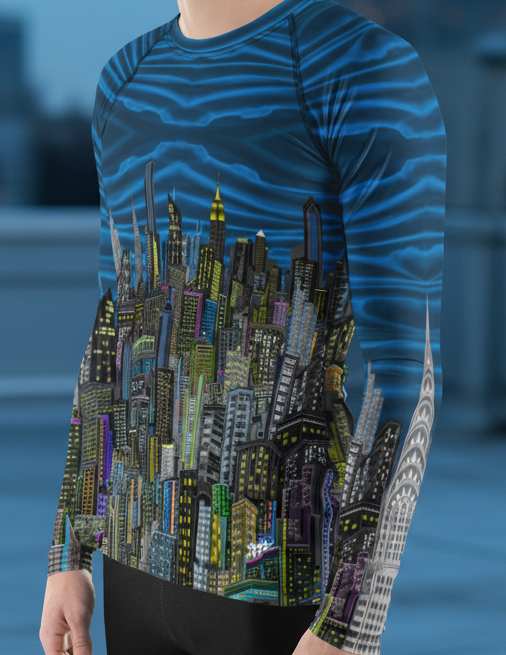 Person wearing a blue and black patterned long-sleeve Loria NYC Art rashguard shirt with cityscape design