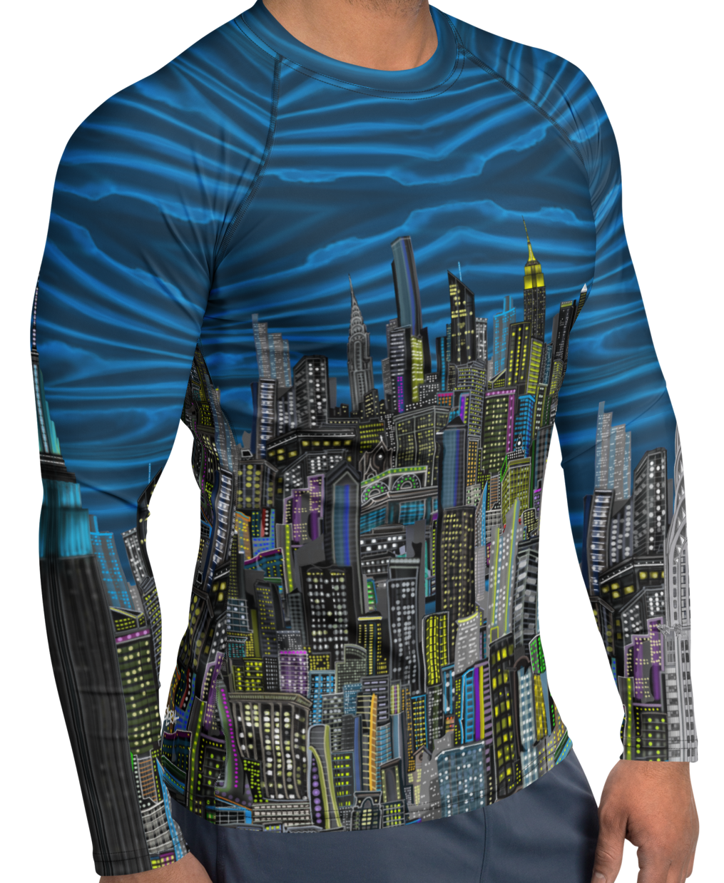Man wearing a Loria NYC Art blue and black patterned long-sleeve shirt on a white background
