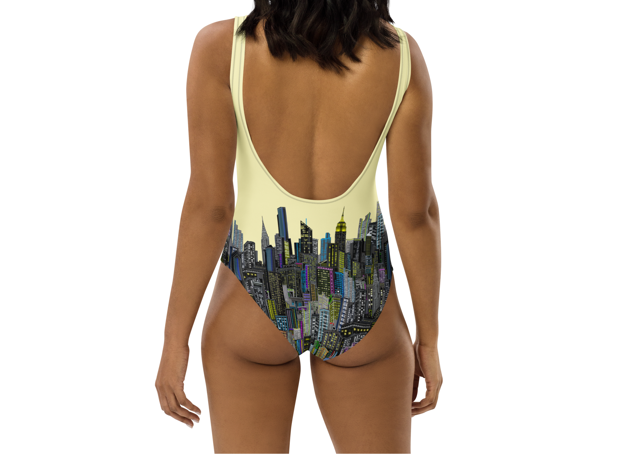 Woman wearing a swimsuit with Loria NYC Art cityscape design on a white background