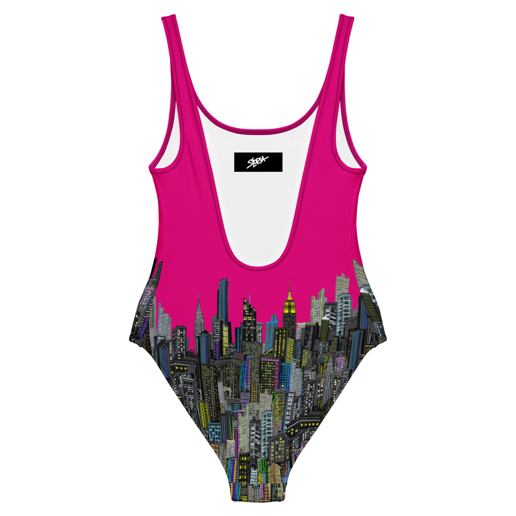 Rear view of a fuchsia swimsuit with cityscape Loria NYC Artdesign on a white background