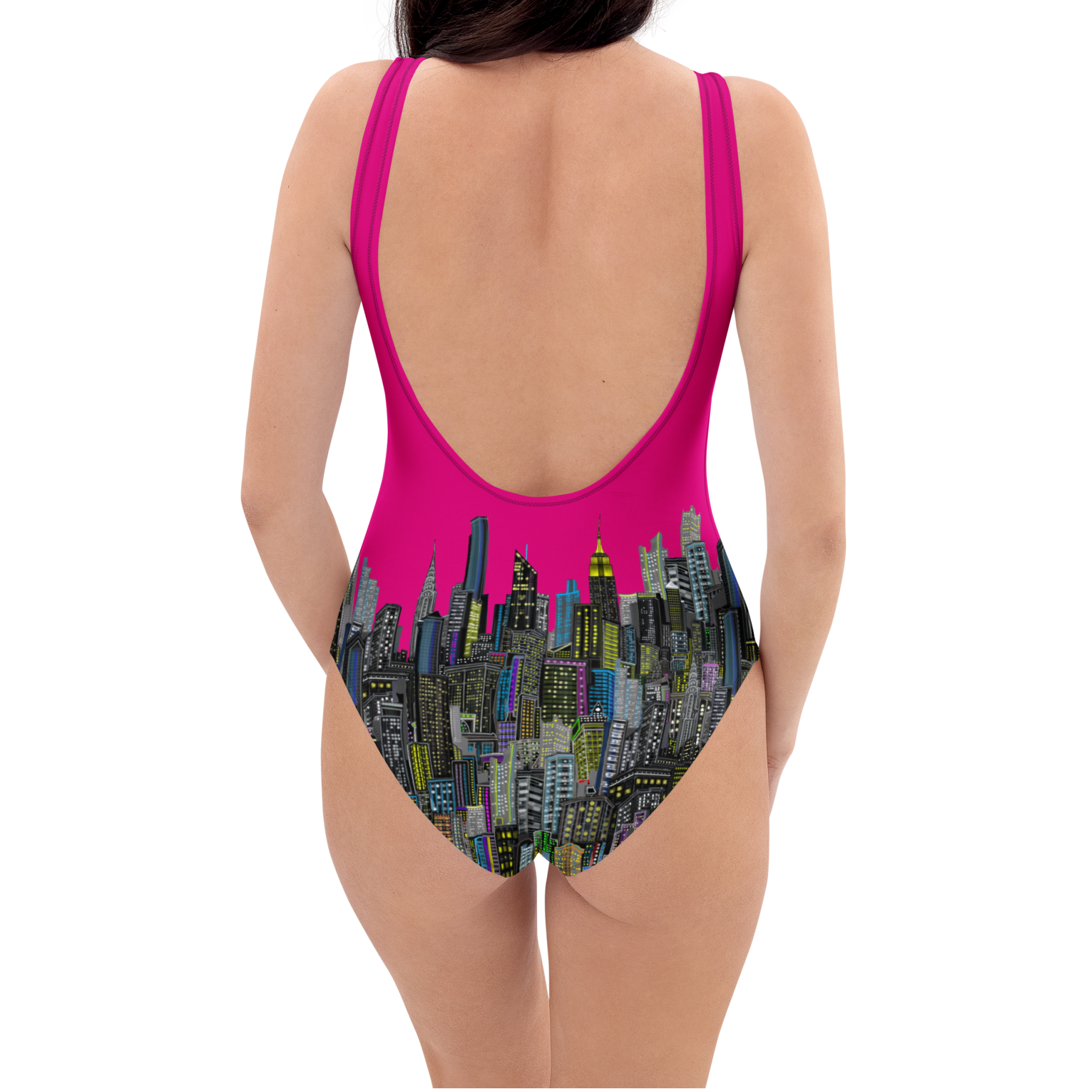 A women’s back view of a fuchsia swimsuit with cityscape Loria NYC Art design on a white background