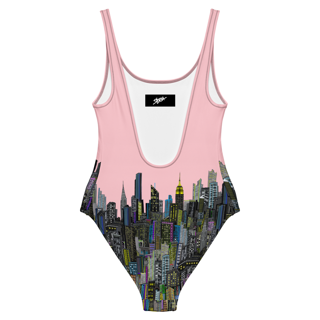 Back of a One-piece swimsuit with cityscape Loria NYC Art design on a pink background