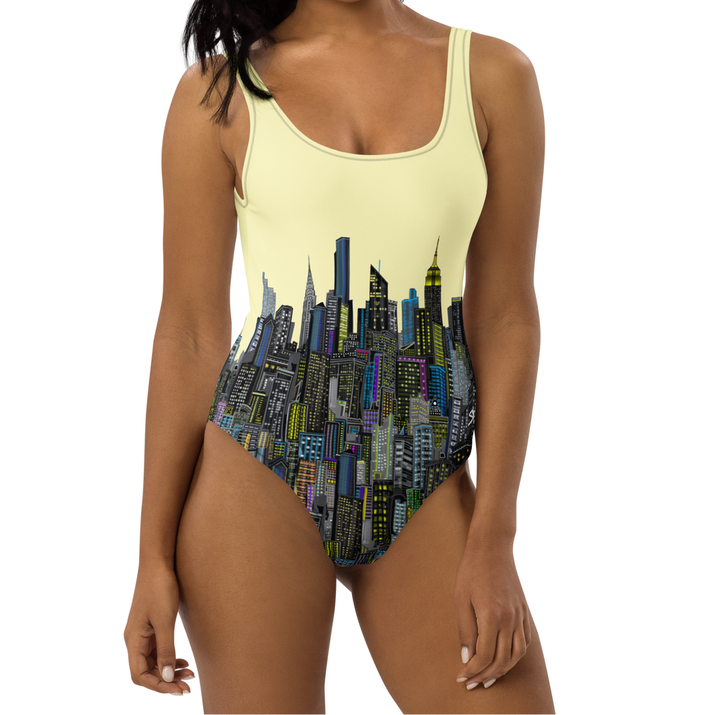 Woman wearing a one-piece swimsuit with cityscape Loria NYC Art design on a white background