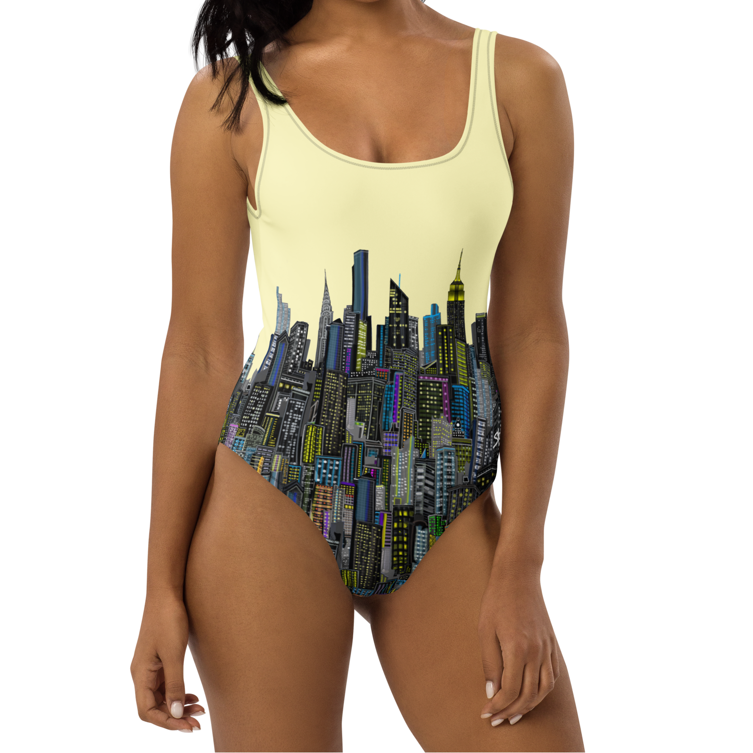 Woman wearing a one-piece swimsuit with cityscape Loria NYC Art design on a white background