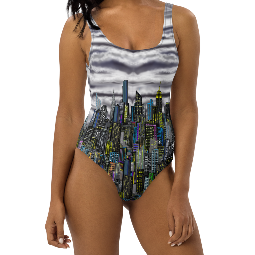 Woman wearing a cityscape Loria NYC Art swimsuit on a white background