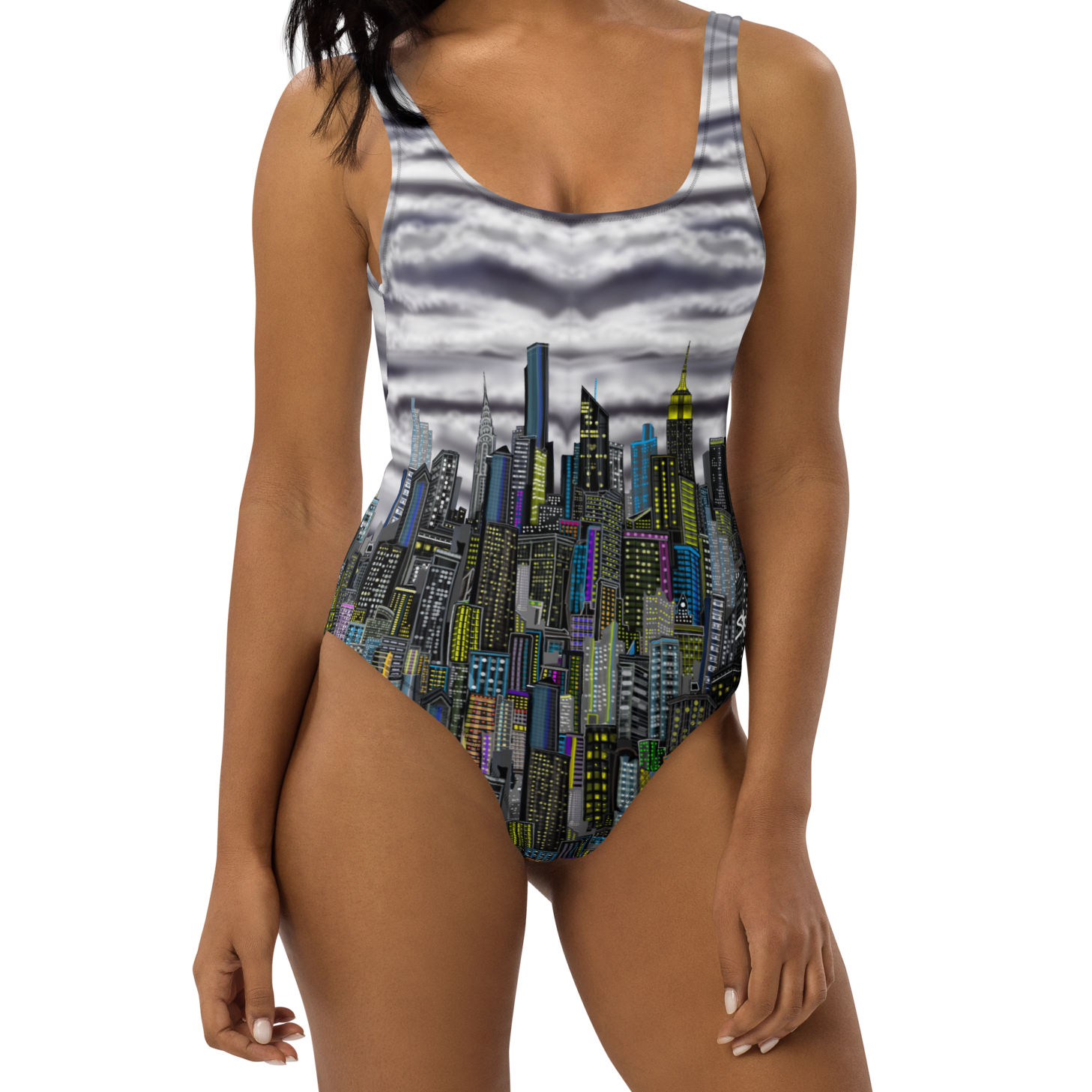 Woman wearing a cityscape Loria NYC Art swimsuit on a white background