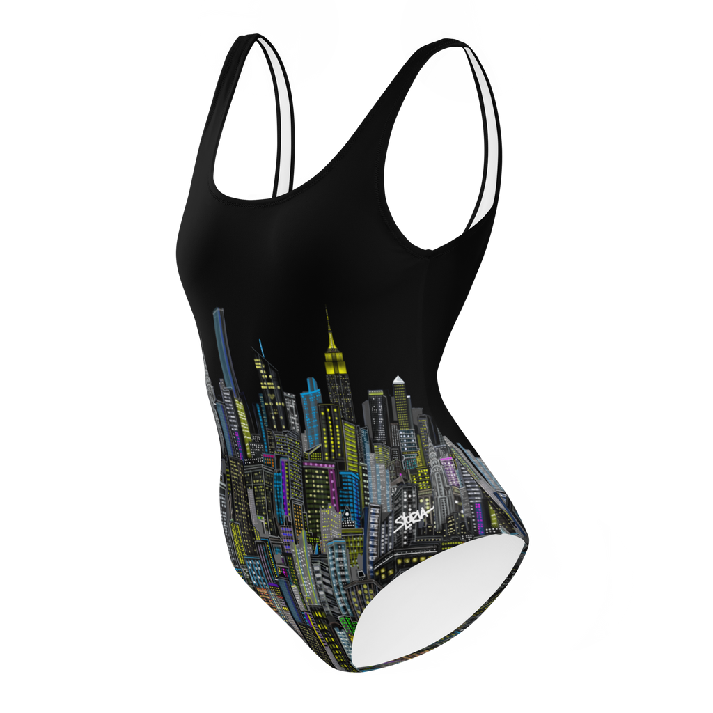 Side of a Black swimsuit with Loria NYC Art cityscape design on a white background
