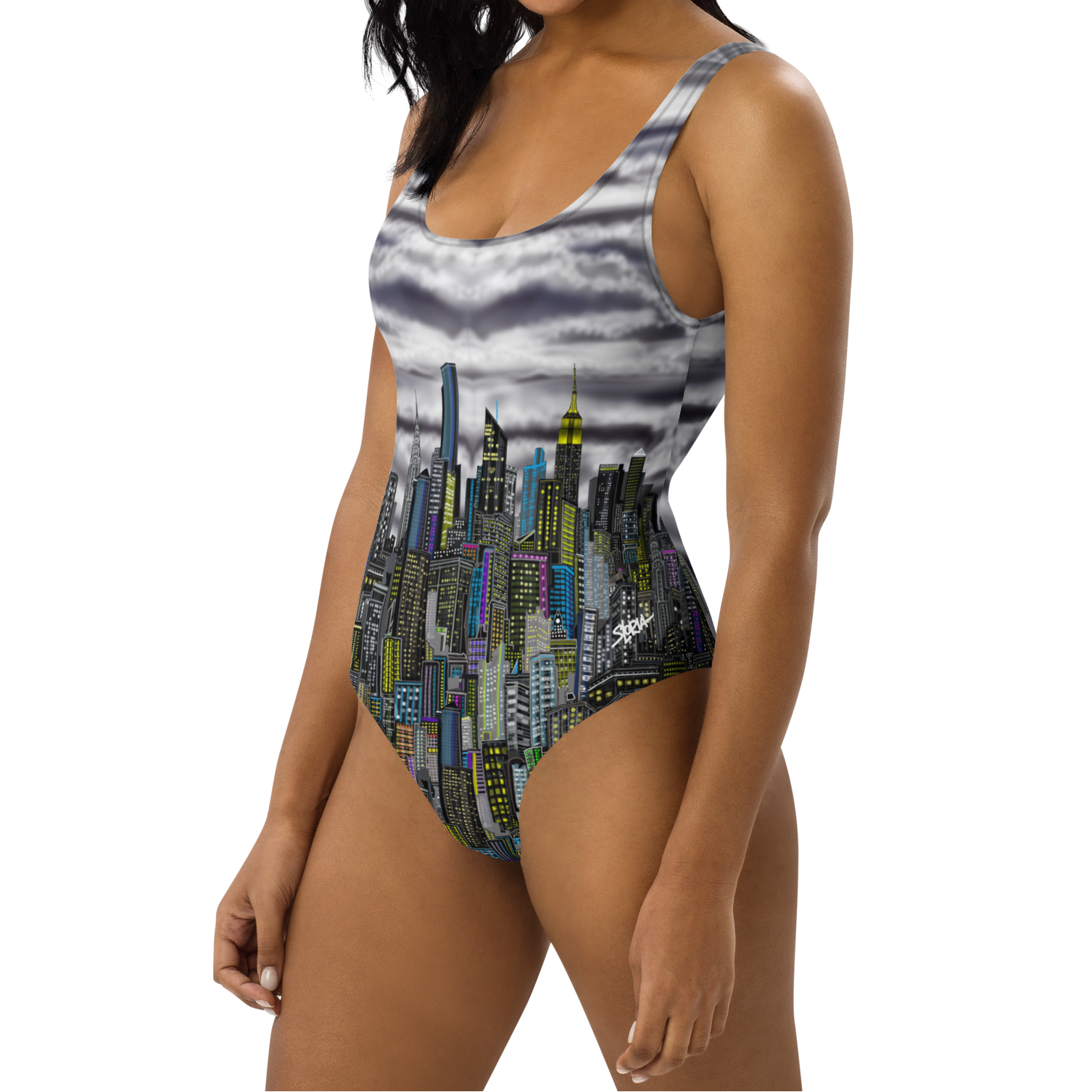 Woman wearing a one-piece swimsuit with cityscape Loria NYC Art design on a white background