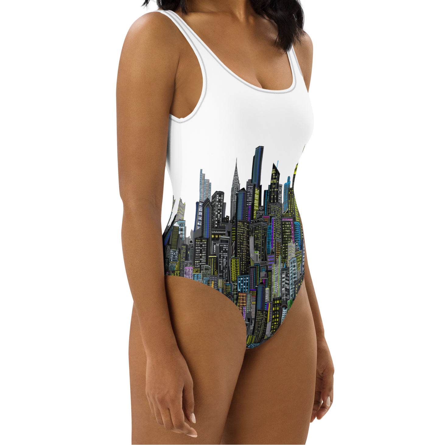 Woman wearing a white one-piece swimsuit with Loria NYC Art cityscape design on a white background